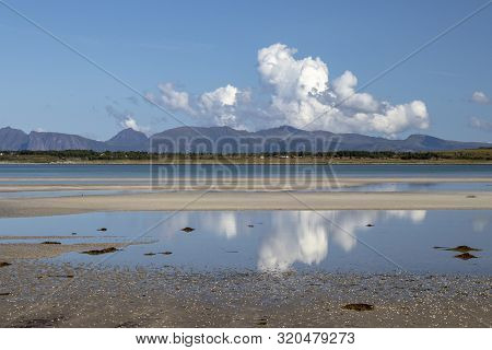 Reflection Of Clouds In The Water At Grunnfor, Vagan, Lofoten Islands, Norway, Scandinavia
