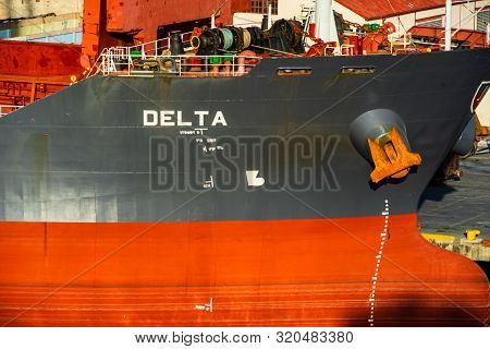 Santiago De Cuba, Cuba - 2019. Old Rusty Ship Docked In The Bay Of Santiago De Cuba.