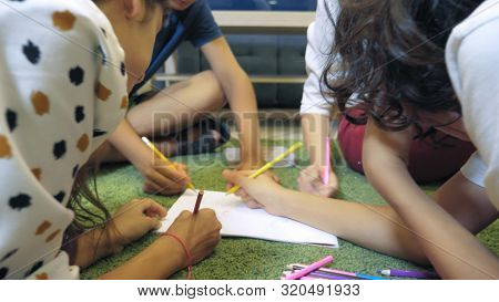The Concept Of Childrens Group Psychotherapy. Female Psychologist Conducts A Group Consultation With