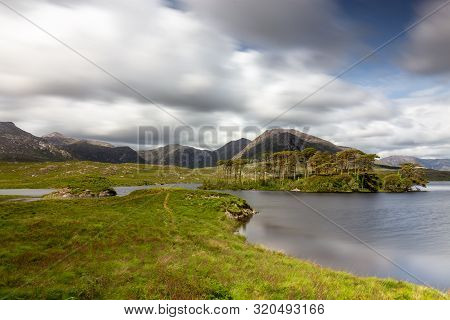 Famous 12 Pines Island On Derryclare Lough, Ireland
