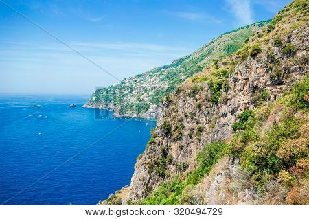 Beautiful Cozy Bay With Boats And Clear Turquoise Water In Italy