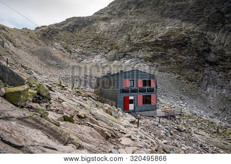 Cottage Under Rysy Peak On Rocky Ground In High Tatras, Slovakia