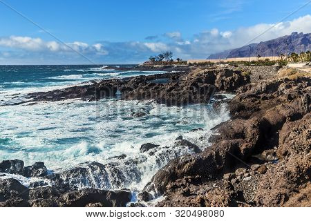 Volcanic Coastline Of The Atlantic Ocean In The Small Fishing Village Of Alcala. Tenerife, Canary Is