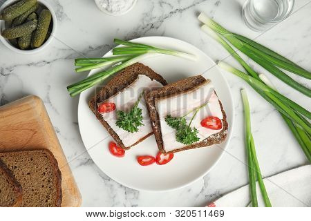 Plate With Pork Fatback Sandwiches Served On Marble Background, Flat Lay