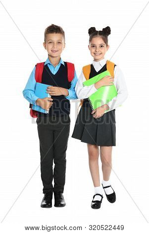 Happy Children In School Uniform On White Background