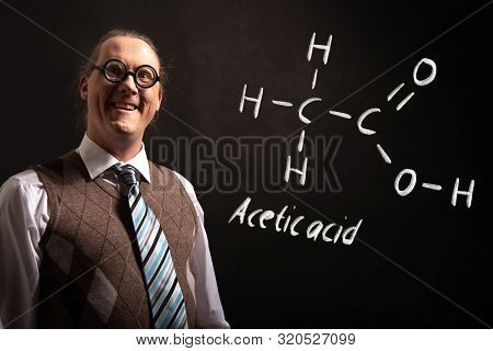 Professor Presenting Handdrawn Chemical Formula Of Acetic Acid Ch3cooh Molecule