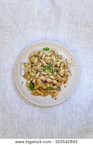 Traditional Soviet Russian Pasta Dish, Vermicelli, Navy Pasta, With Meat On A White Plate On A Light
