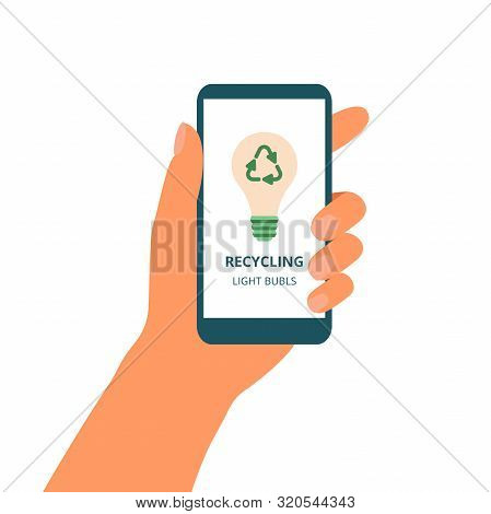 Hand Holds Mobile Phone With Green Concept Of Recycle Light Bubls On The Display. Waste Recycle Mana