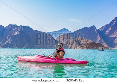 Hatta Kayaking Young Man Kayaking In Hatta Dam Beautiful Place For Water Adventure Activities Like B