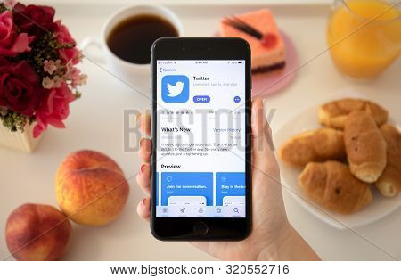Anapa, Russia - July 23, 2019: Woman Hand Holding Iphone 8 Plus With Social Networking Service Twitt