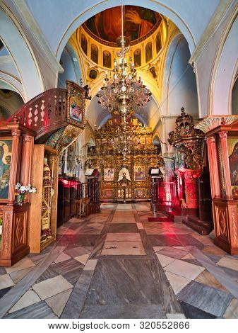 Ano Mera, Mykonos, Greece - July 23 2019 Interior With Various Sacred Images And Altars With Decorat