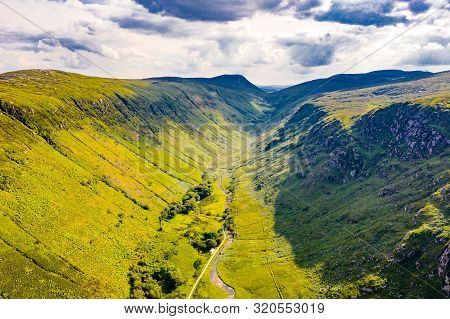 Aerial View Of The Glenveagh National Park With Castle Castle And Loch In The Back Looking Towards L