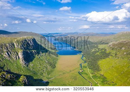 Aerial View Of The Glenveagh National Park With Castle Castle And Loch In The Background - County Do
