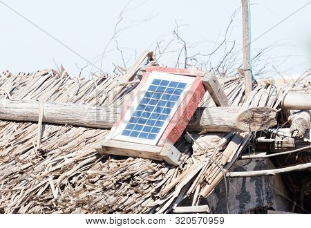 Small Solar Panel On A Large Roof In Madagascar