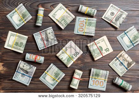 Colored Background With Money American Hundred Dollar Bills On Top Wiev With Copy Space For Your Tex