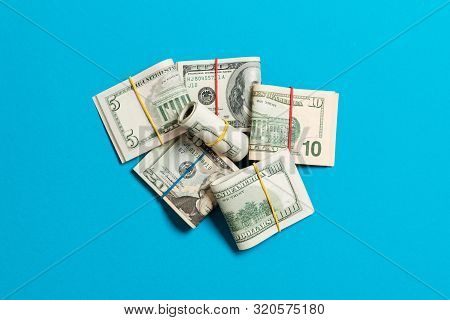 Us Dollar Bills Bundles Stack. One Hundred Dollar Bills With Stack Of Money In The Middle. Top View 