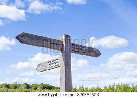 Sign Post In Heartwood Forest In St Albans Directing Hikers To Nature Walks And Hiking Route