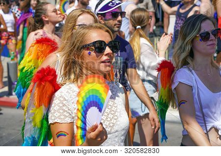 The Annual Parade Lgbt. Gay And Lesbians Walking In The Gay Pride Parade. Parade Of Tolerance. Rainb