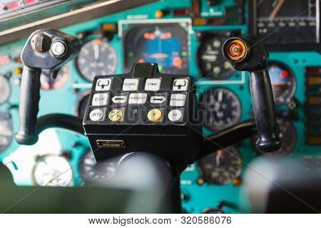 A Inside View Of The Dashboard In Helicopter Pilot Cabin - Pilot Wheel