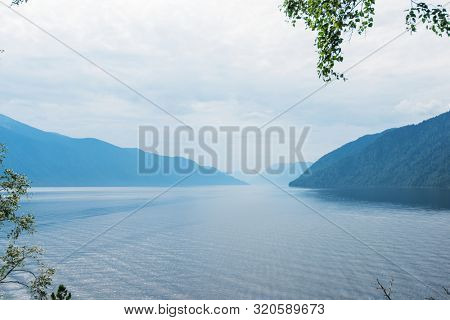 Teletskoye lake in Altai mountains, Siberia, Russia. Beauty summer morning. The lake is a UNESCO World Cultural and Natural Heritage Site.