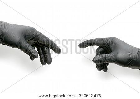 Two Hands In Black Rubber Gloves, One Pointing To The Other. Allusion To The Picture Creation Of Ada