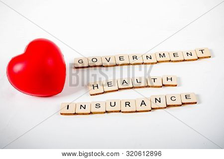 Healthcare Concept Showing A Heart And The Message Government Health Insurance