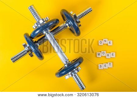 Healthcare Concept Showing Dumbbells And The Message One More Set