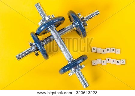 Healthcare Concept Showing Dumbbells And The Message Weight Lifting Weight Lifting