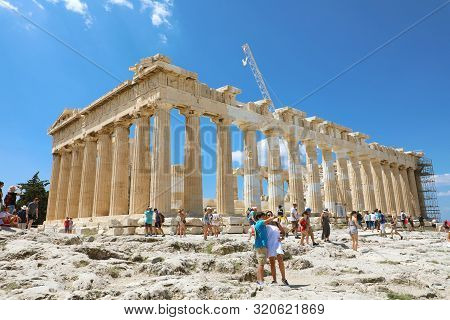 Athens, Greece - July 18, 2018: Tourists Take Picture Near Parthenon Temple On The Acropolis Of Athe