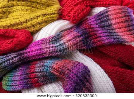 Winter Multi-colored Woolen Shaf As A Background.