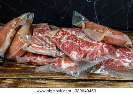 The Meat Is Vacuum Packed . Cooking Meat In Packages Of The Sous Vide Technology.
