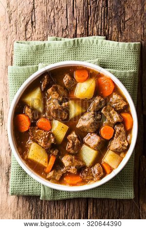 Fresh Homemade Beef Stew With Carrot And Potatoes Served In Bowl, Photographed Overhead