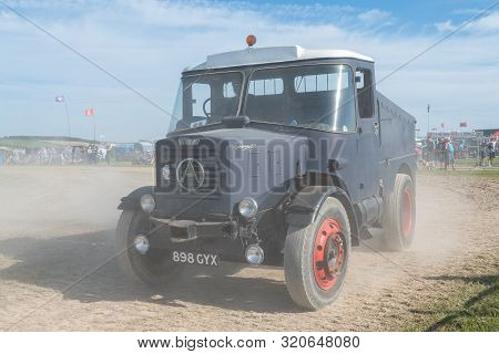 Blandford Forum.dorset.united Kingdom.august 24th 2019.a Restored Vintage Lorry Is Being Driven At T