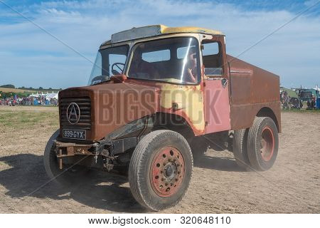 Blandford Forum.dorset.united Kingdom.august 24th 2019.a Vintage Lorry Is Being Driven At The Great 