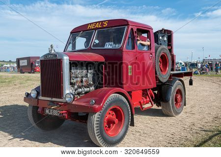 Blandford Forum.dorset.united Kingdom.august 24th 2019.a Restored Vintage Lorry Is Being Driven At T