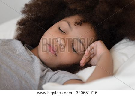 Close Up Mixed Race Cute Peaceful Child Girl Napping.