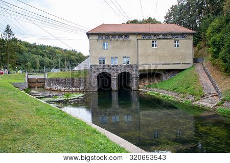 Rutki, Pomorskie / Poland - September, 5, 2019: Hydroelectric Power Plant On The Radunia River. A Bu