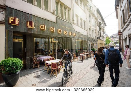 Strasbourg, France - May 18, 2019: People Walking Near The Floderer Cafe Restaurant In Central Stras