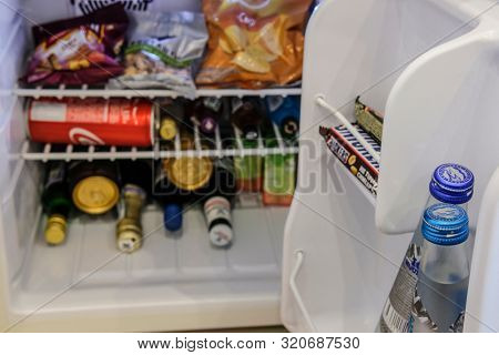 Mosocw region, Russia - August, 23, 2019: beer cans and food in the fridge in a hotel room in Moscow region, Russia