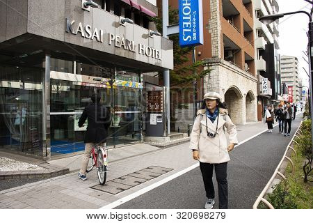 Traveler Thai Women And Japanese People Walking Beside Road Of Kannana Dori Street At Higashi Kasai 