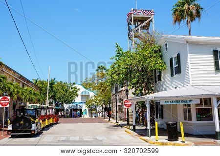 Key West, Florida Usa - April 13, 2016: The Historic And Popular Center And Duval Street In Downtown