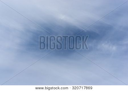 Blue Sky In Blurry Cirrus Clouds. Space For Text.