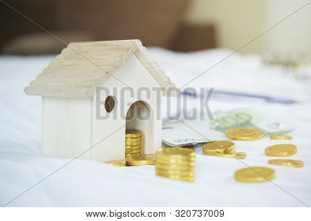 Saving, Retirement Plan, Financial Planning Concept. Young Couple Counting Money With Hime. Family P