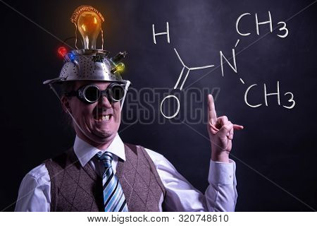 Nerd Presenting Handdrawn Chemical Formula Of Dimethylformamide