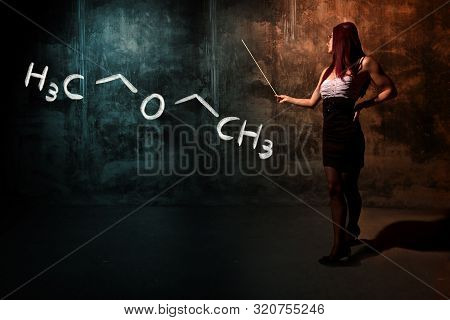 Sexy Girl Or Secretary Or Female Student Presenting Handdrawn Chemical Formula Of Diethylether