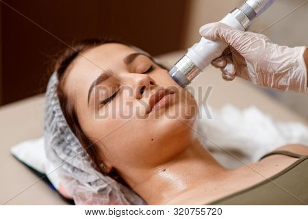 Lymphatic Drainage Massage Lpg Apparatus Process. Therapist Beautician Makes A Rejuvenating Facial M