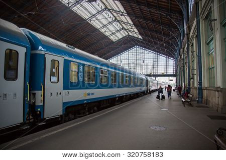 Budapest, 05.2019:  Nyugati Station Territory, Train And Passengers
