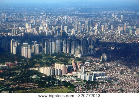Manila City Aerial View With Districts Of Taguig, Bonifacio Global City And Ortigas Center.