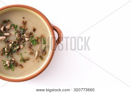 Homemade Mushroom Soup Isolated On White Background.top View. Copyspace