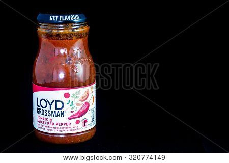Torrevieja, Spain - Sept 06 2019 : Loyd Grossman Sauce Isolated On Black, With Copy Space.